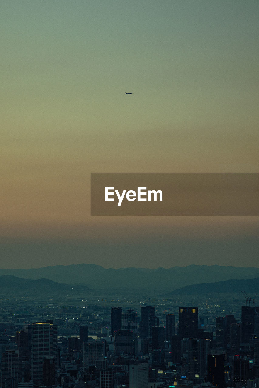 high angle view of city at sunset