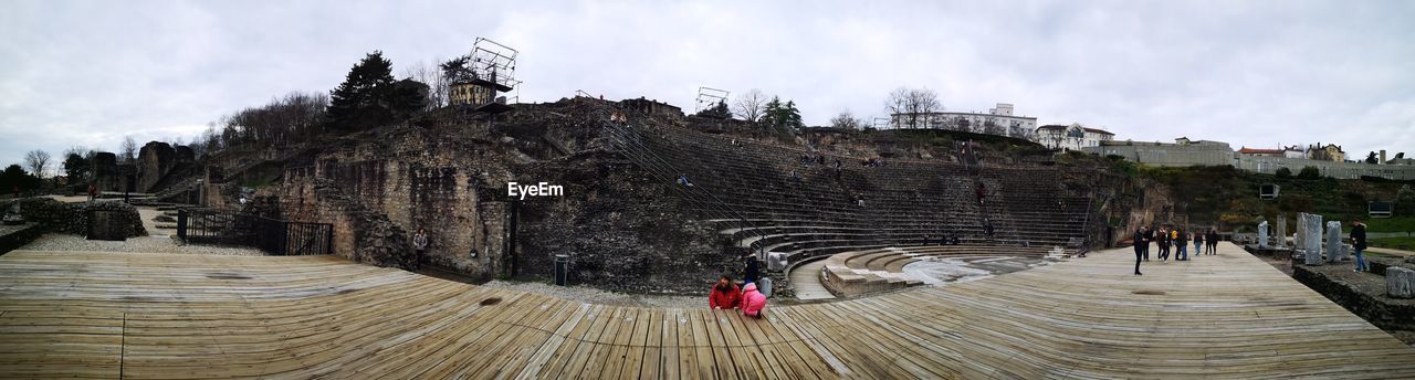 PANORAMIC VIEW OF PEOPLE ON THE BEACH