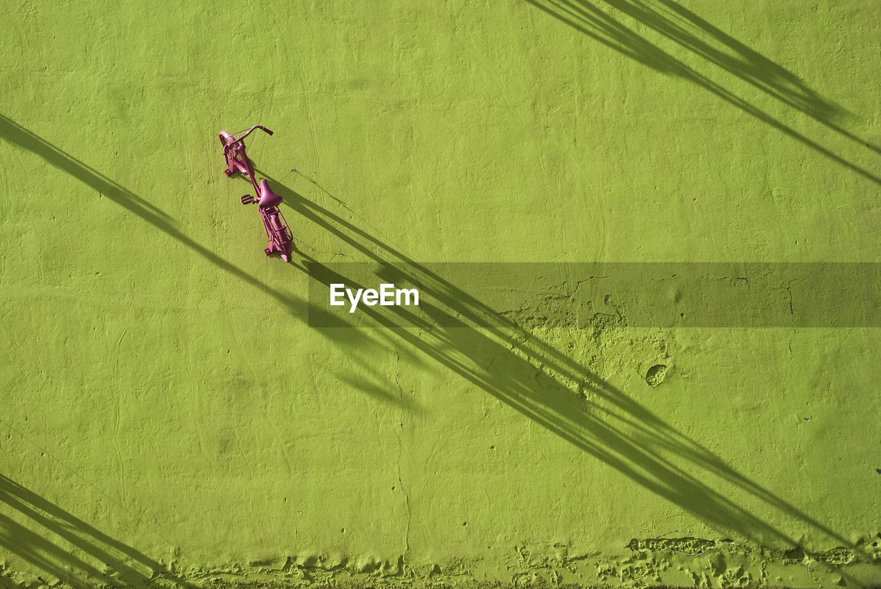 High angle view of a bicycle on wall