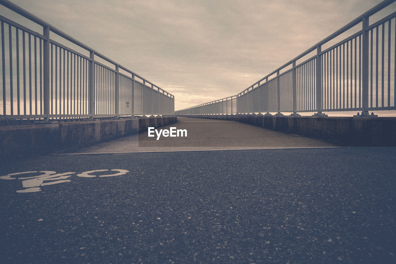 Empty bridge against sky