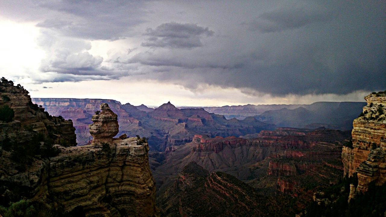 High angle view of grand canyon with overcast sky