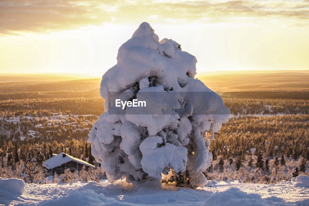 CLOSE-UP OF SNOW DURING SUNSET