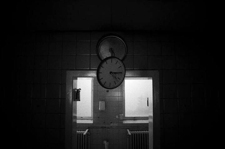 LOW ANGLE VIEW OF CLOCK TOWER