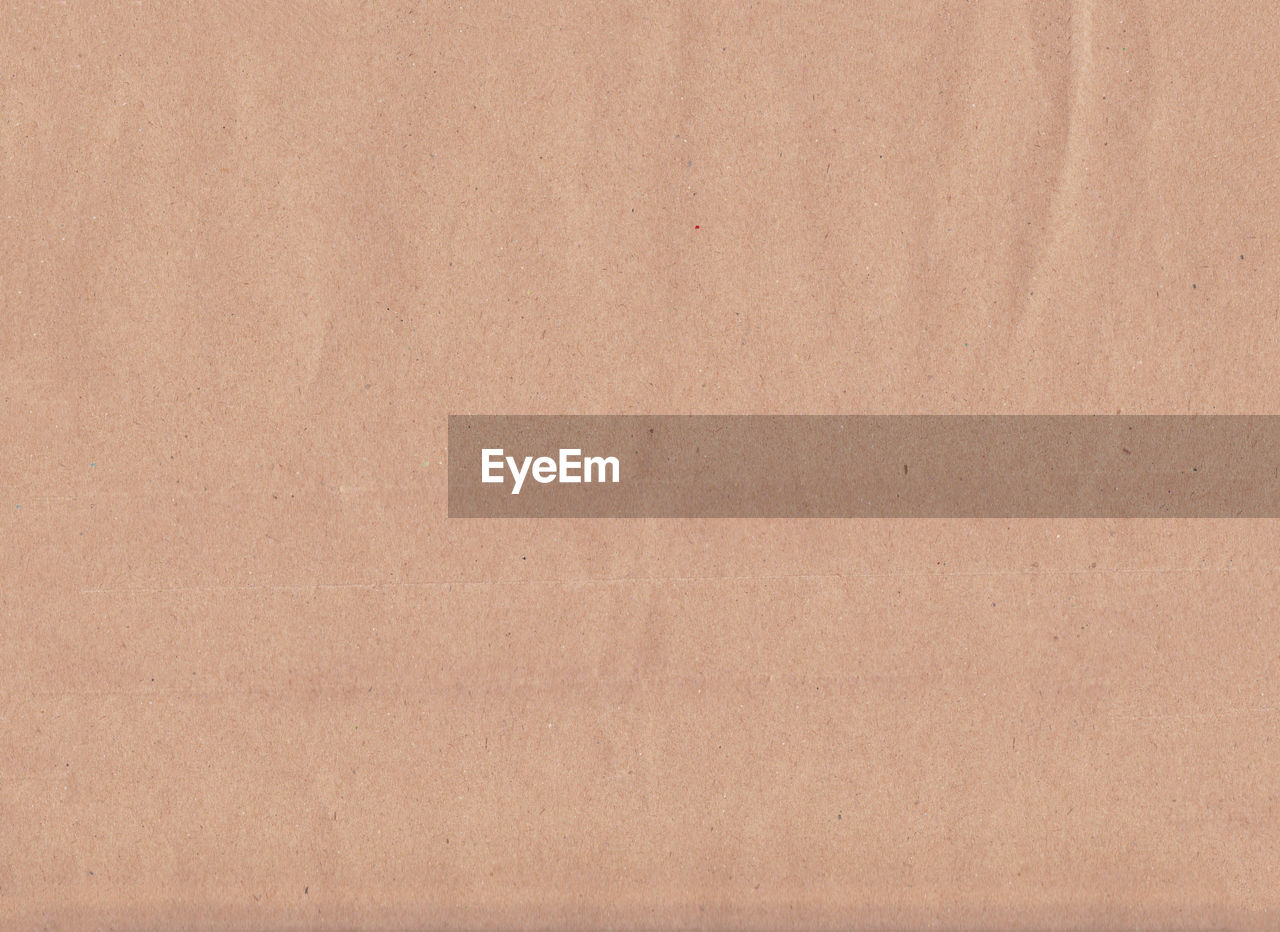 Texture of brown paper background for your design work.