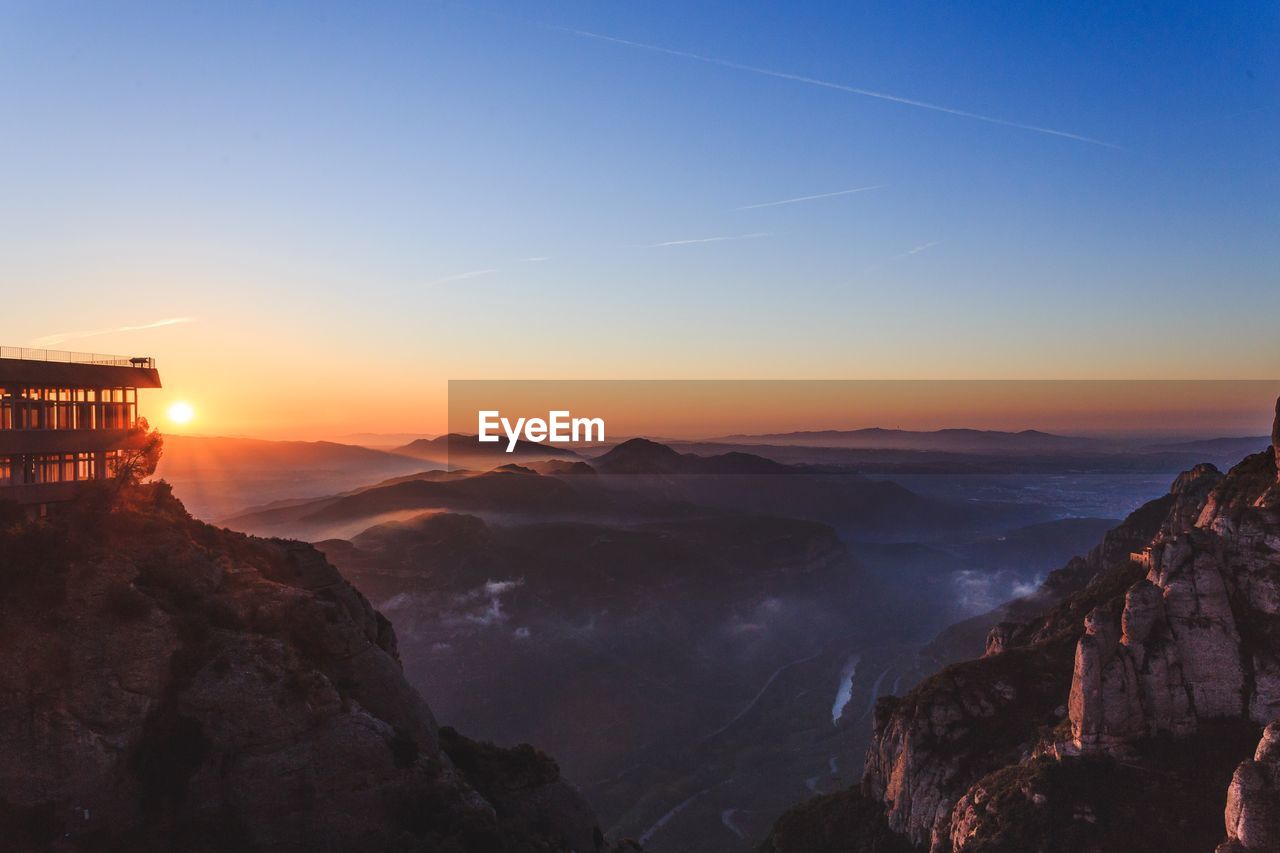Panoramic view of landscape against clear sky during sunset