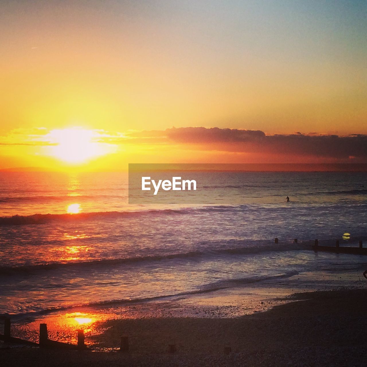 Idyllic view of beach during sunset