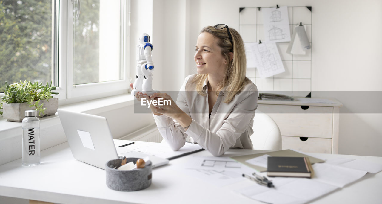 WOMAN LOOKING AT CAMERA