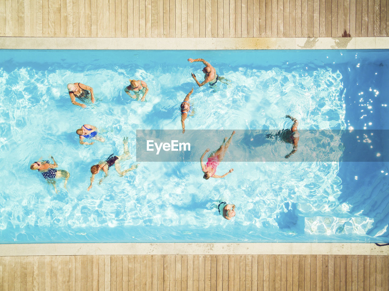 Top view of group of seniors in swimming pool