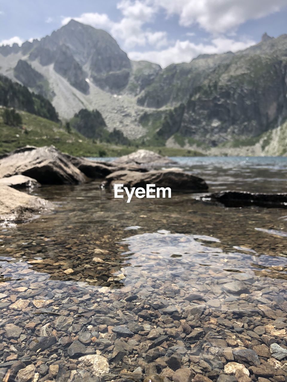 WATER FLOWING THROUGH ROCKS