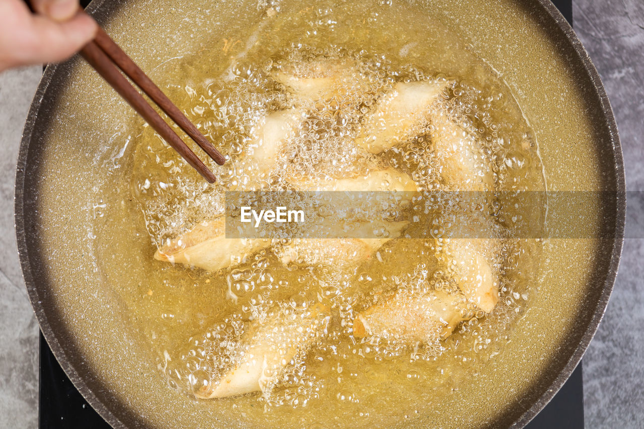 High angle view of person preparing food in bowl
