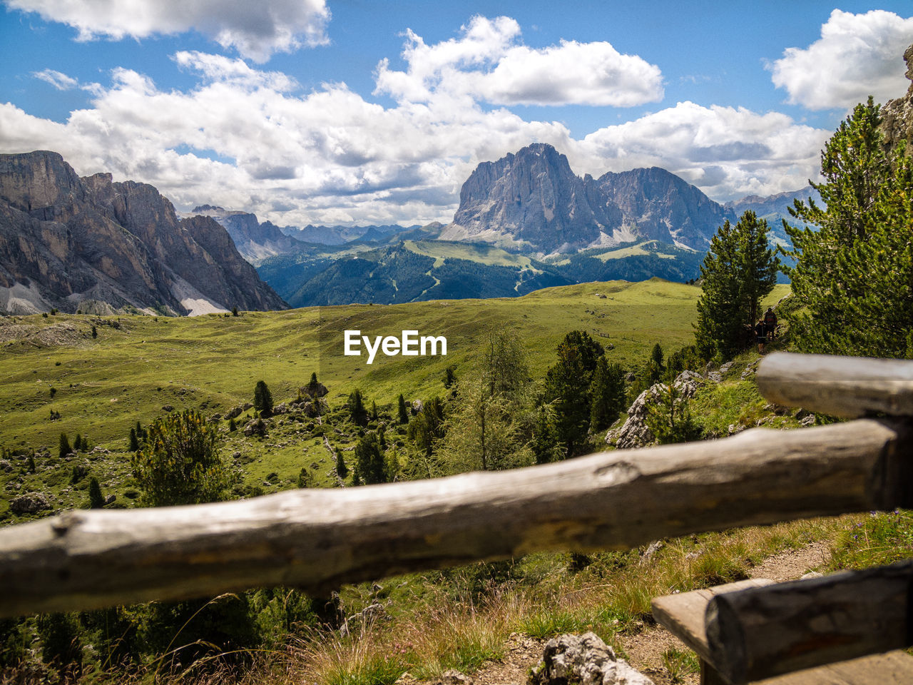 Scenic view of mountains against cloudy sky