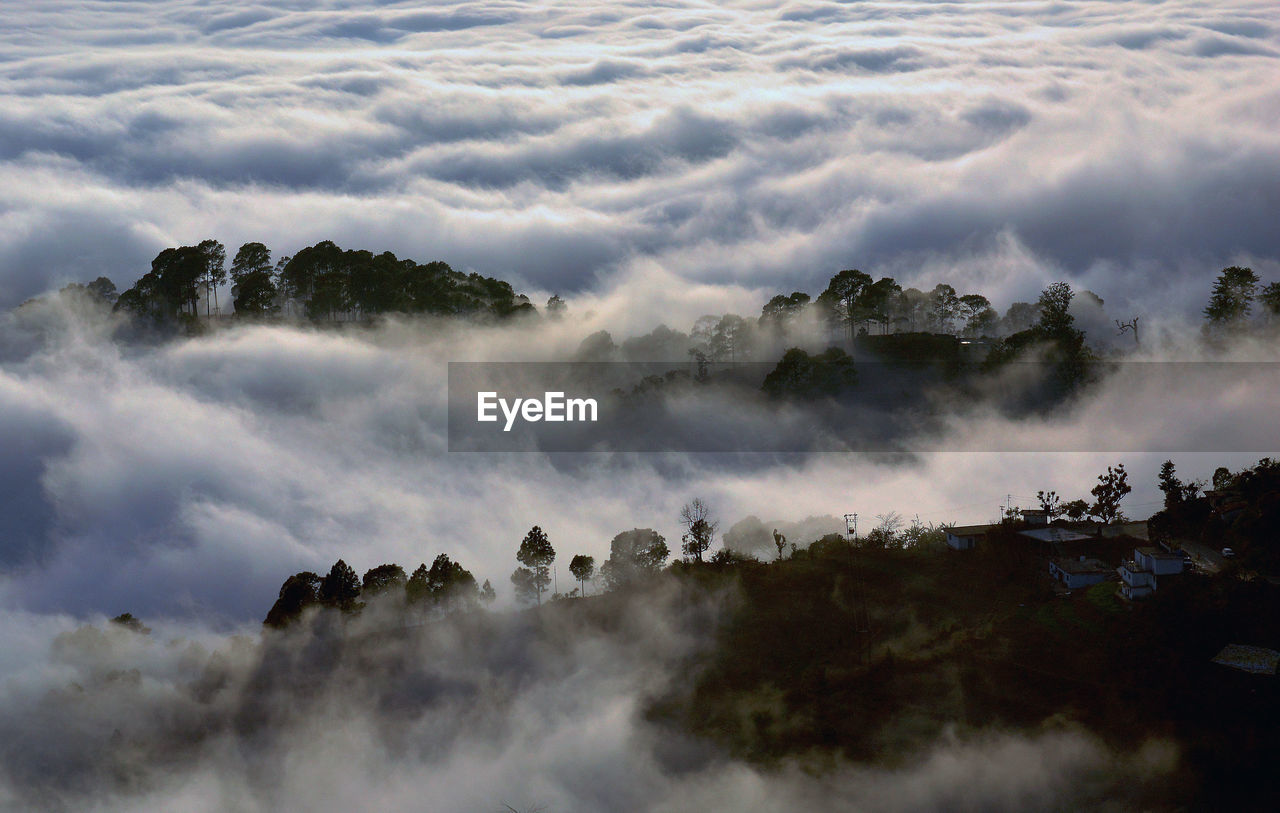 Scenic view of mountain and cloudscape