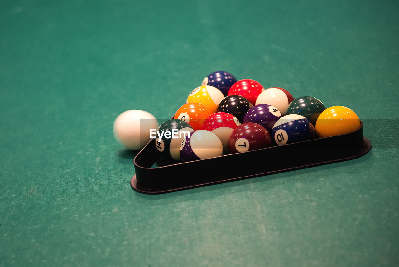 Close-up of pool balls on table