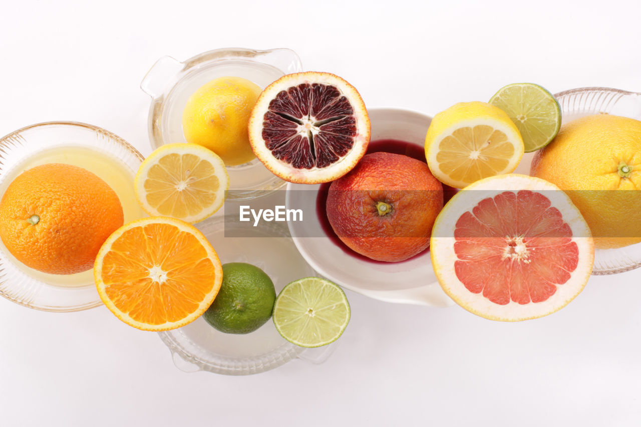 HIGH ANGLE VIEW OF FRUITS IN GLASS