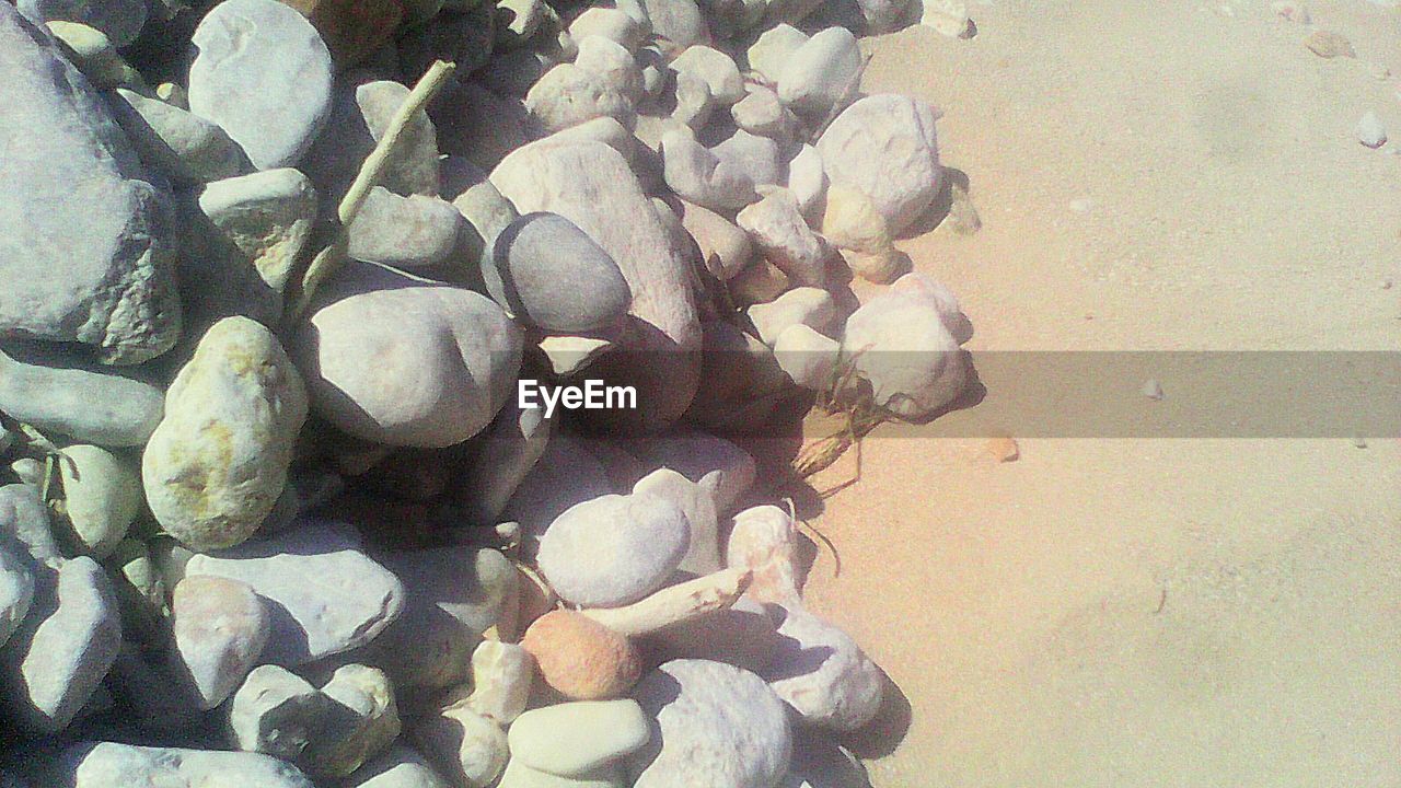 STACK OF PEBBLES ON ROCKS