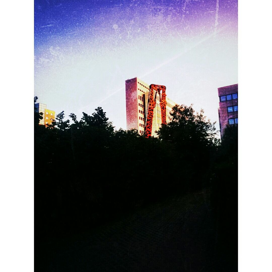 VIEW OF BUILDINGS AGAINST SKY