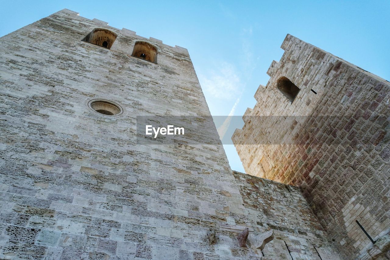 Low angle view of fort against sky