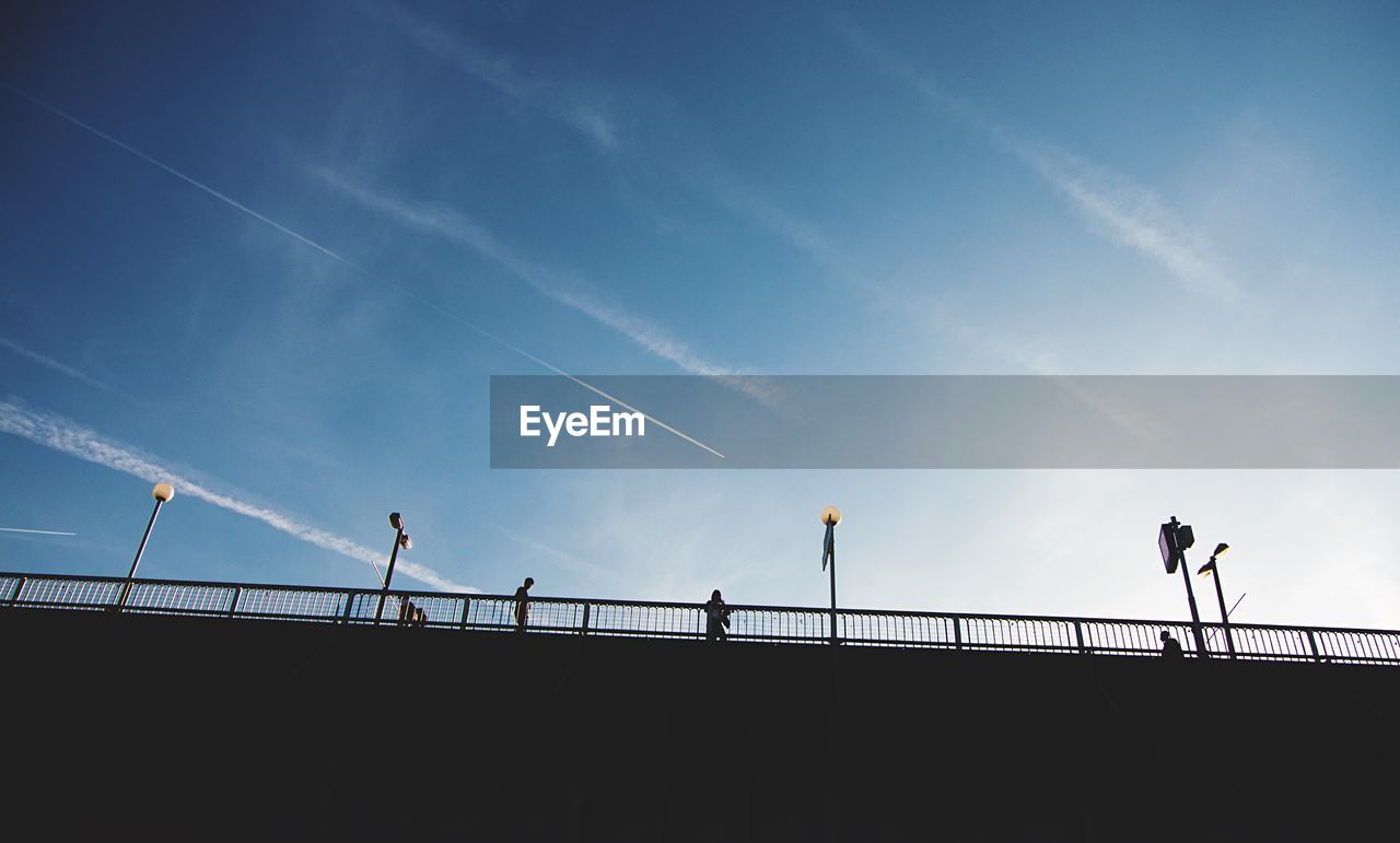 LOW ANGLE VIEW OF SILHOUETTE BRIDGE AGAINST SKY