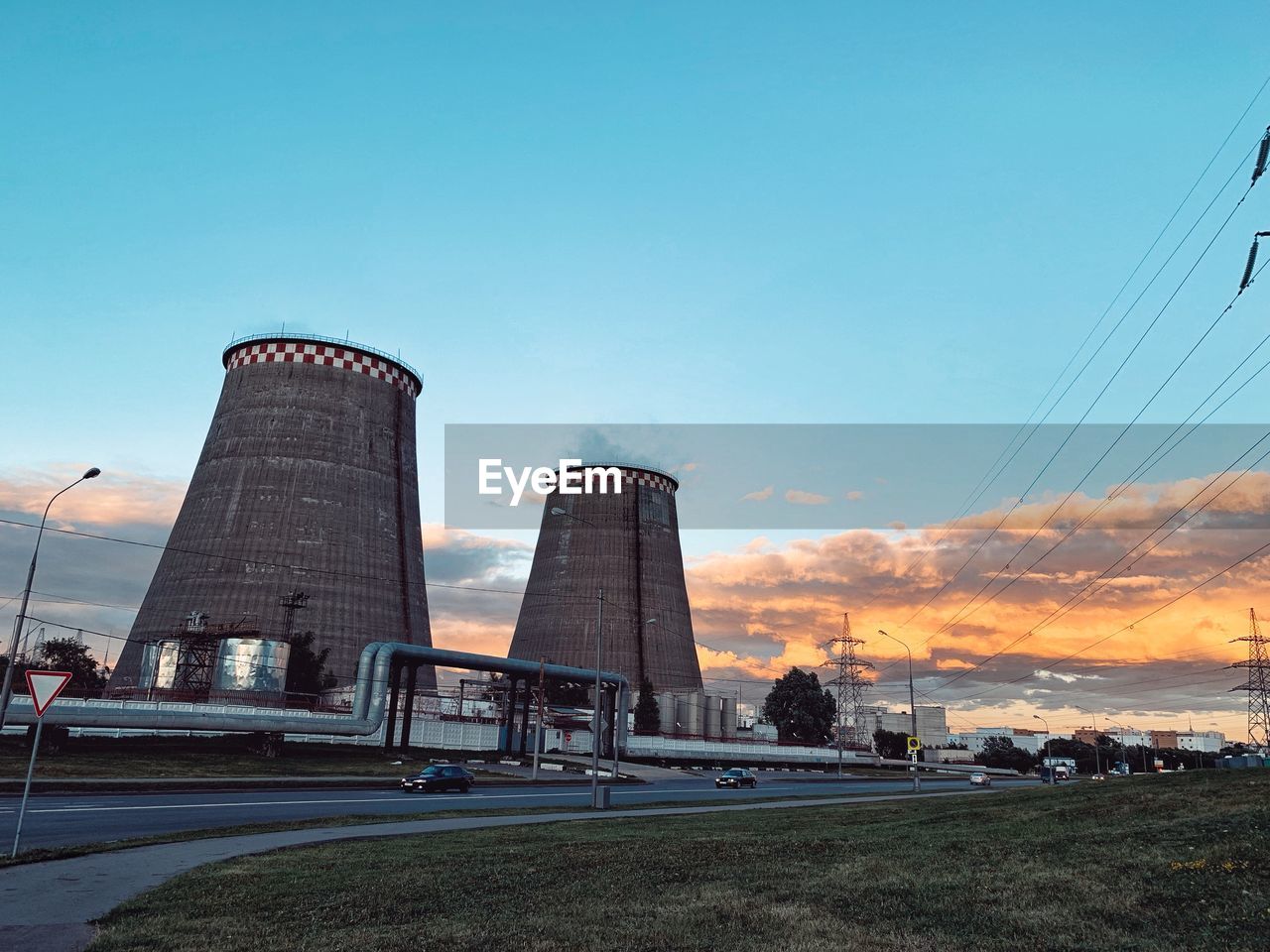 Low angle view of factory against sky