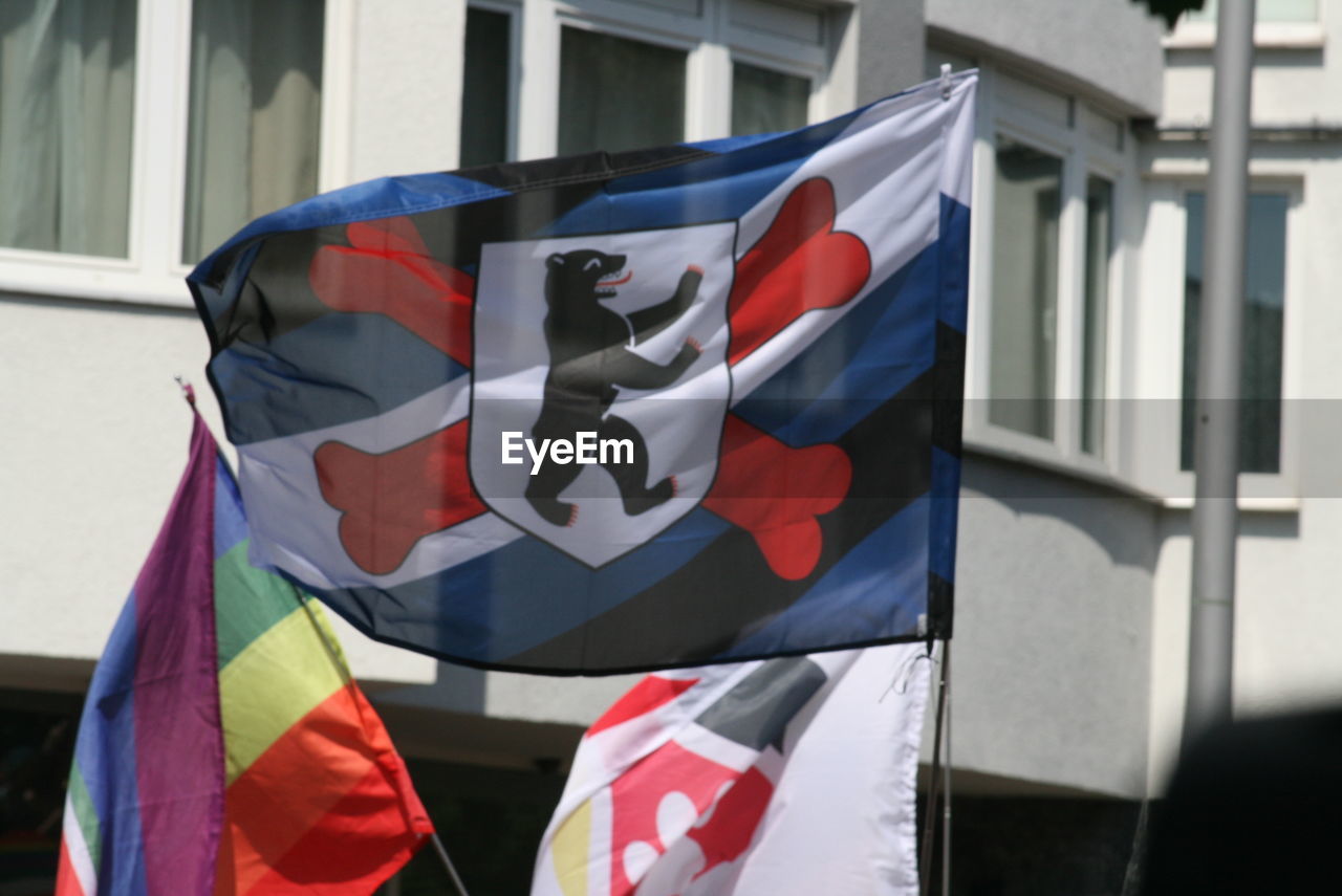 LOW ANGLE VIEW OF FLAG FLAGS