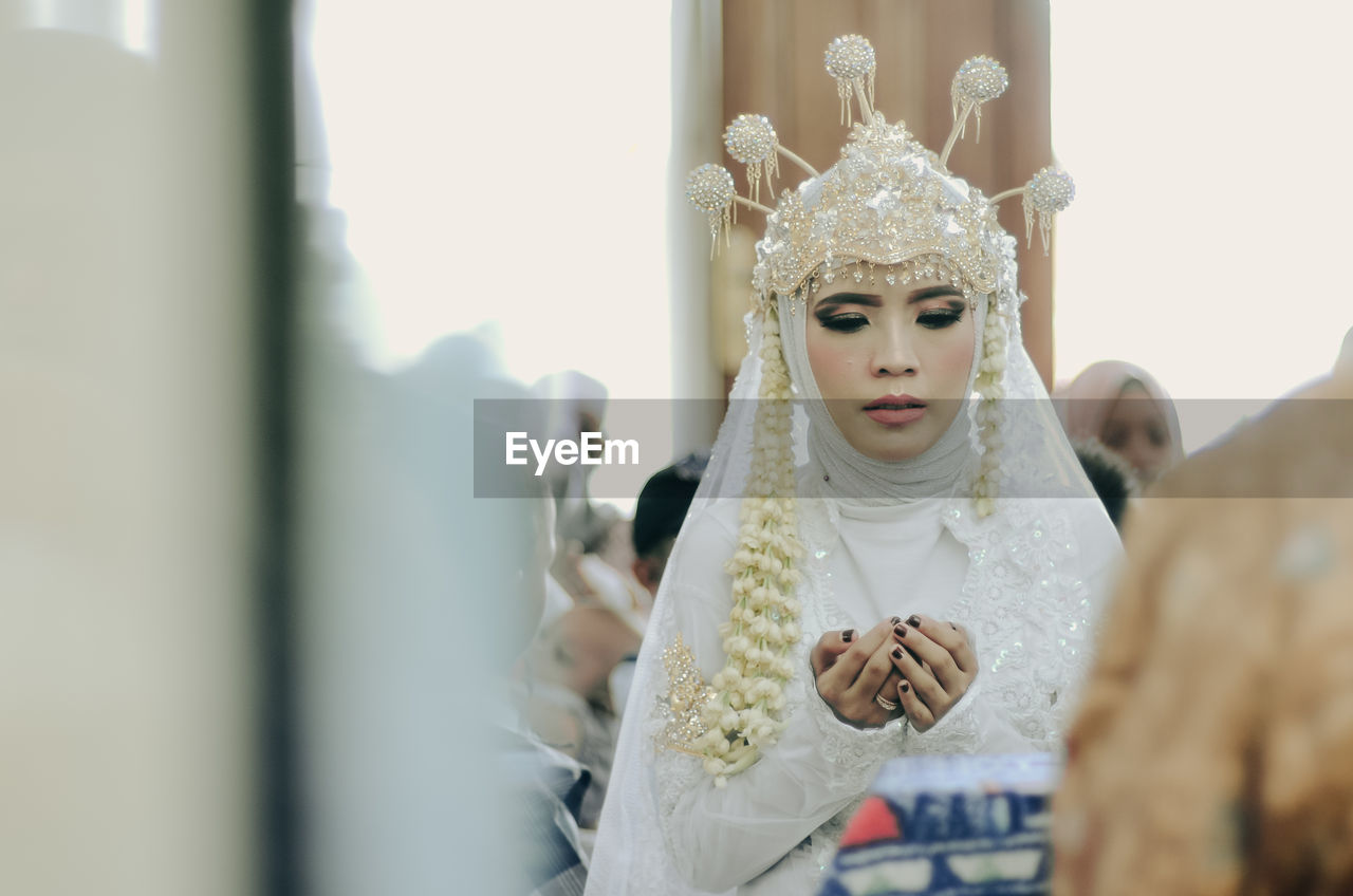 Close-up of bride during wedding ceremony