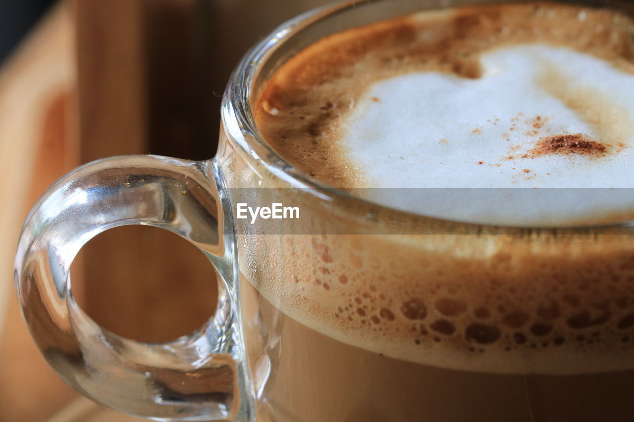 Close-up of coffee cup on table