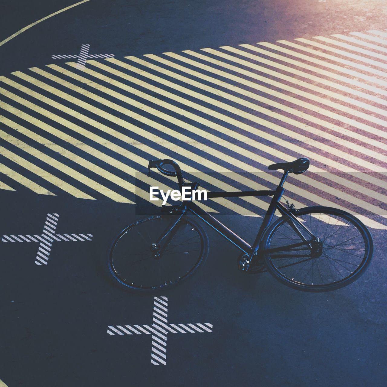 High angle view of bicycle parked on street