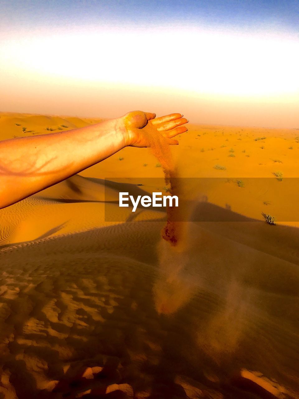 SAND DUNES IN DESERT AGAINST SKY