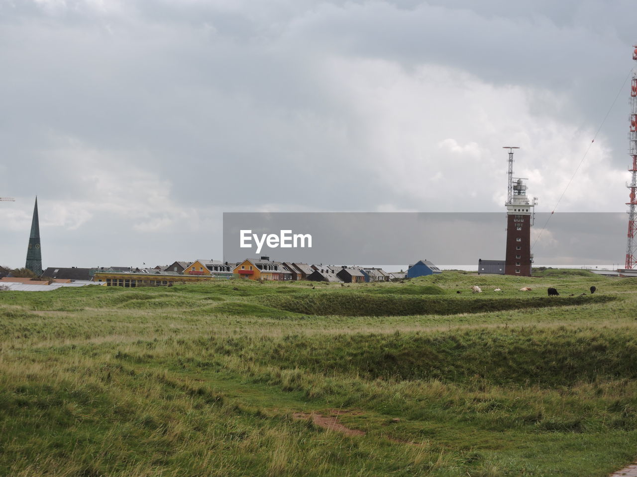 SCENIC VIEW OF LANDSCAPE AGAINST CLOUDY SKY