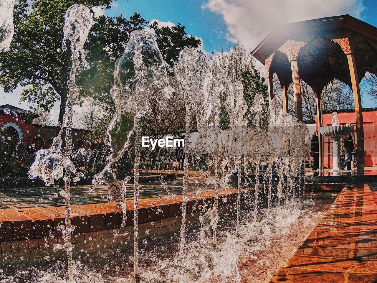 PANORAMIC VIEW OF TREES BY BUILDING