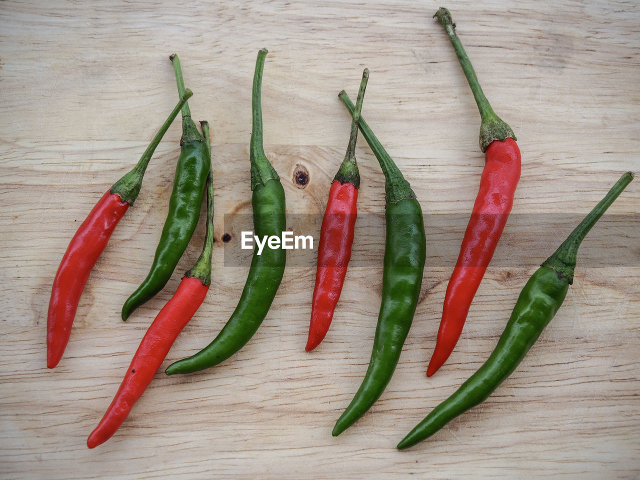 High angle view of chili peppers on table