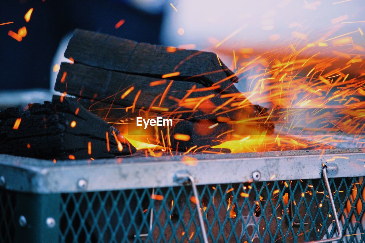 CLOSE-UP OF FIRE ON GRILL