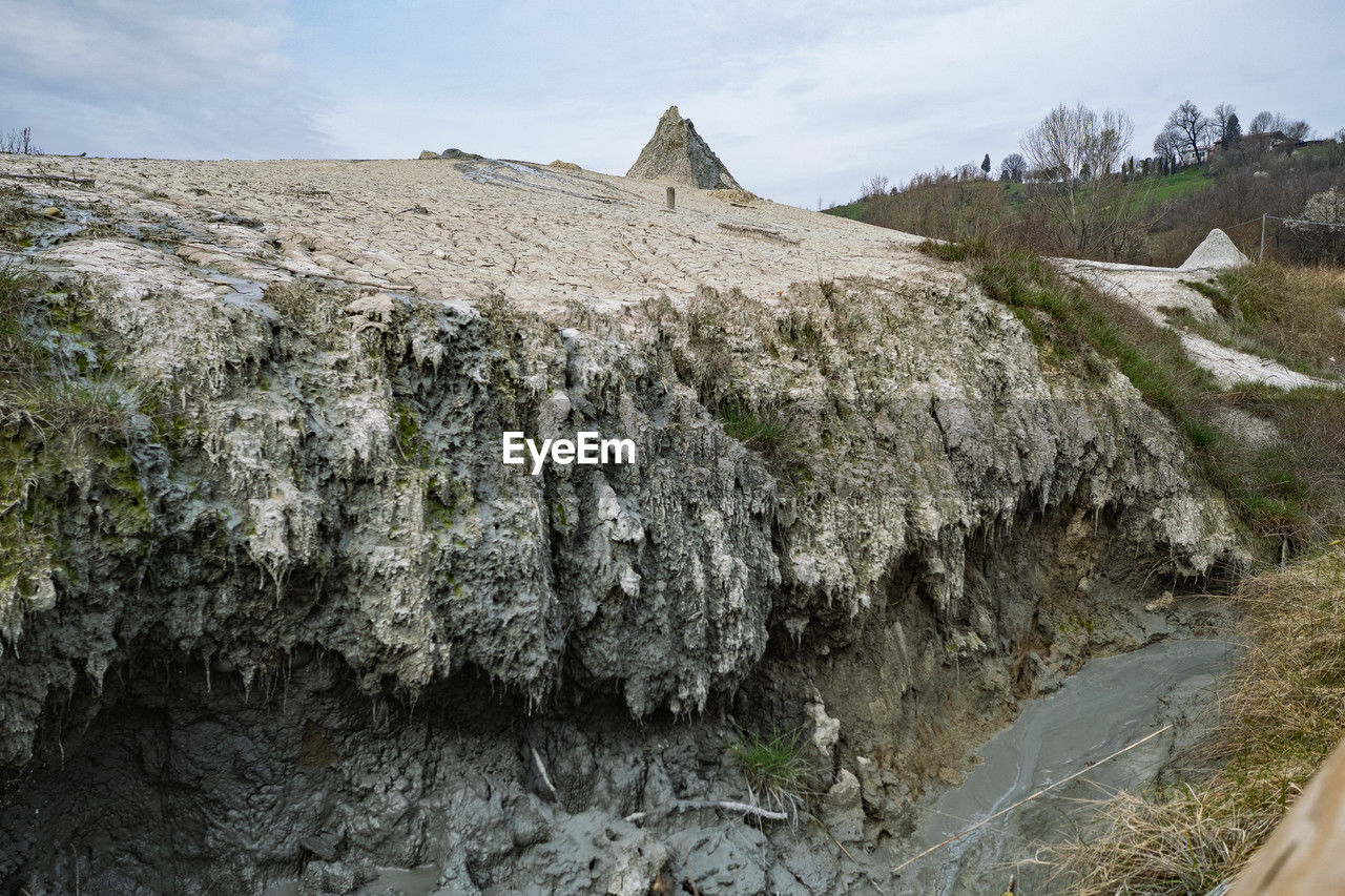 geology, rock, nature, terrain, cliff, environment, landscape, sky, land, plant, scenics - nature, mountain, no people, cloud, beauty in nature, water, formation, outdoors, travel destinations, travel, day, architecture, non-urban scene, ridge, tranquility, tree, tourism, wilderness, built structure