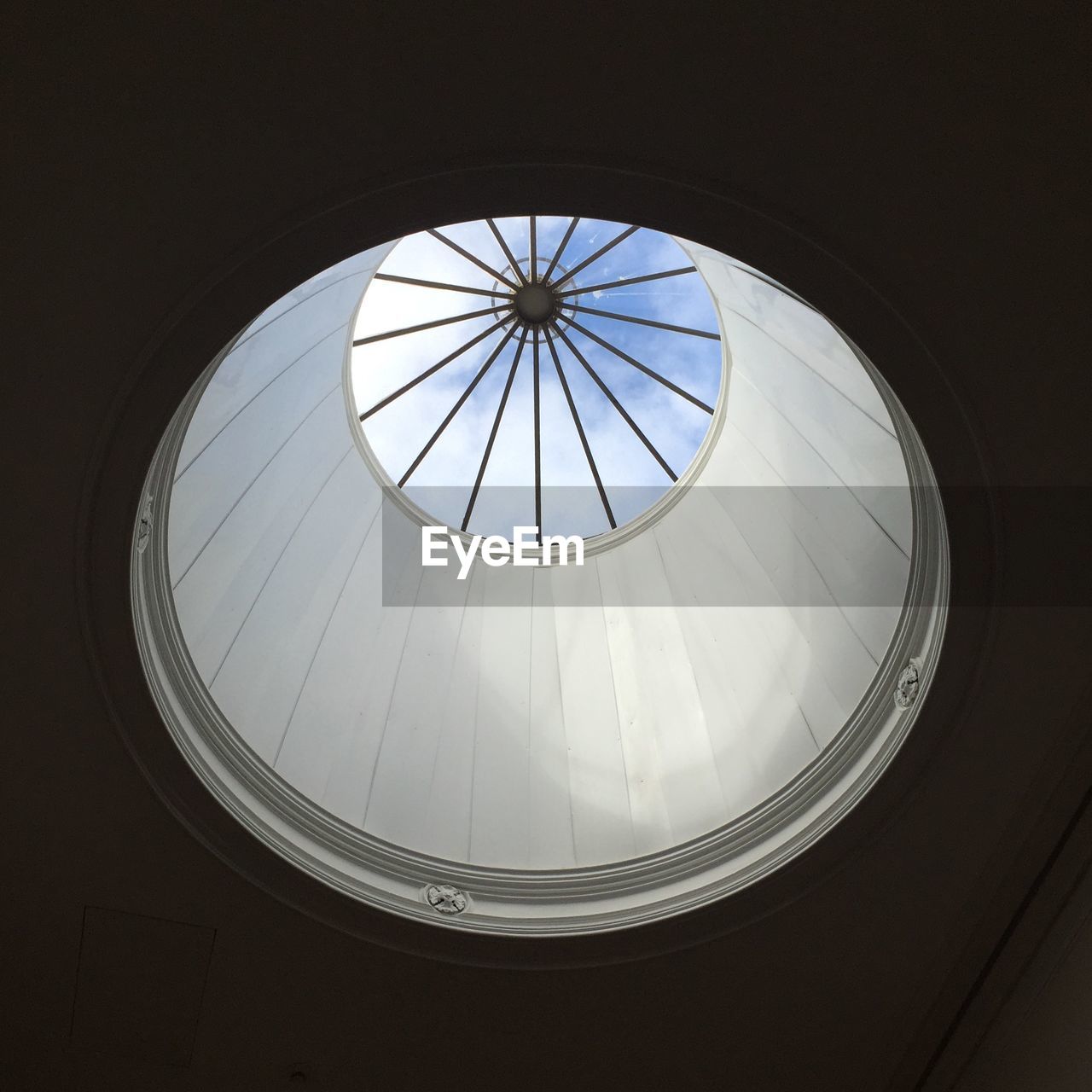 Low angle view of sky seen through cupola