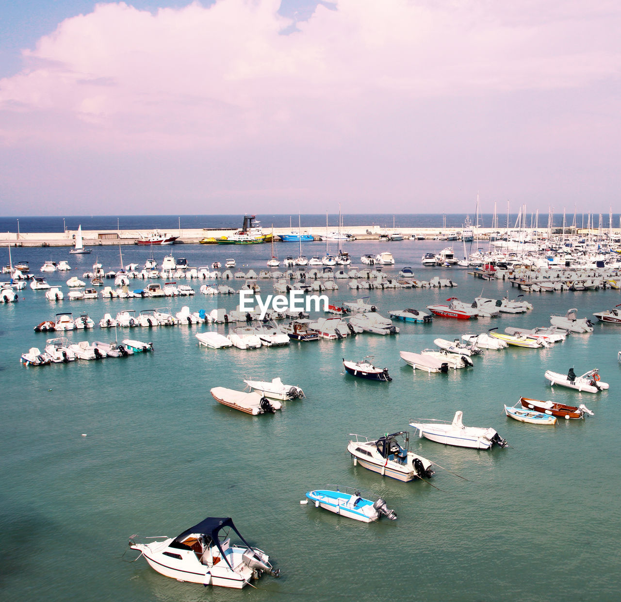 High angle view of boats in sea against sky