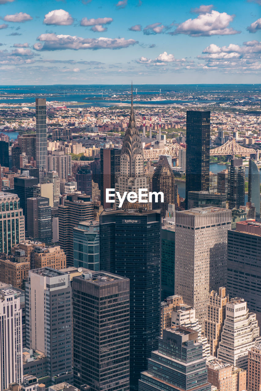 Aerial view of cityscape against sky