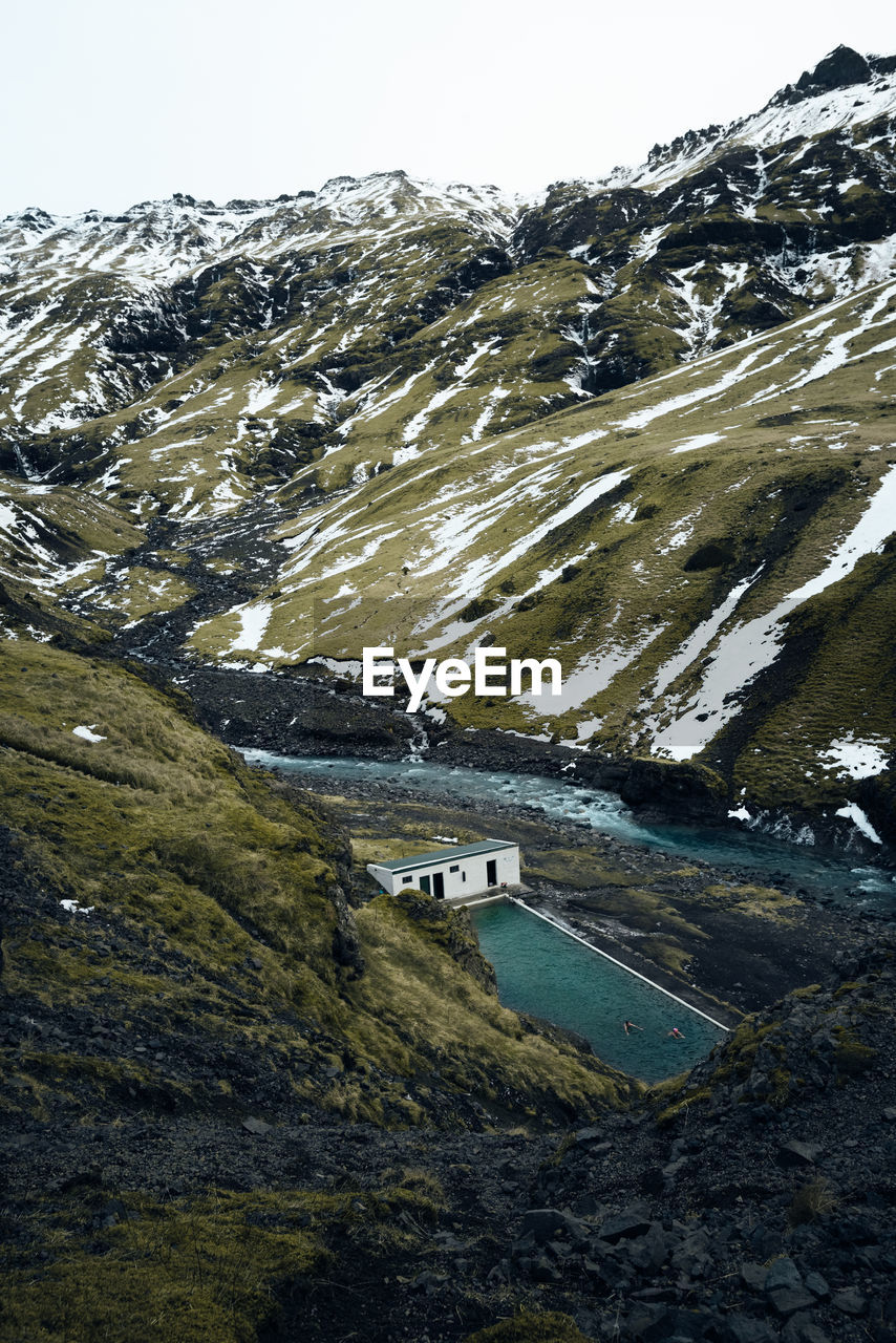 The seljavallalaug outdoor pool embedded in icelands vast nature