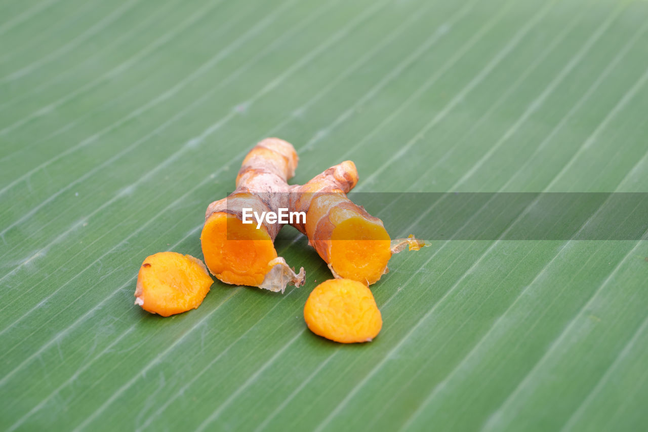 Close-up of  turmeric on banana leaves