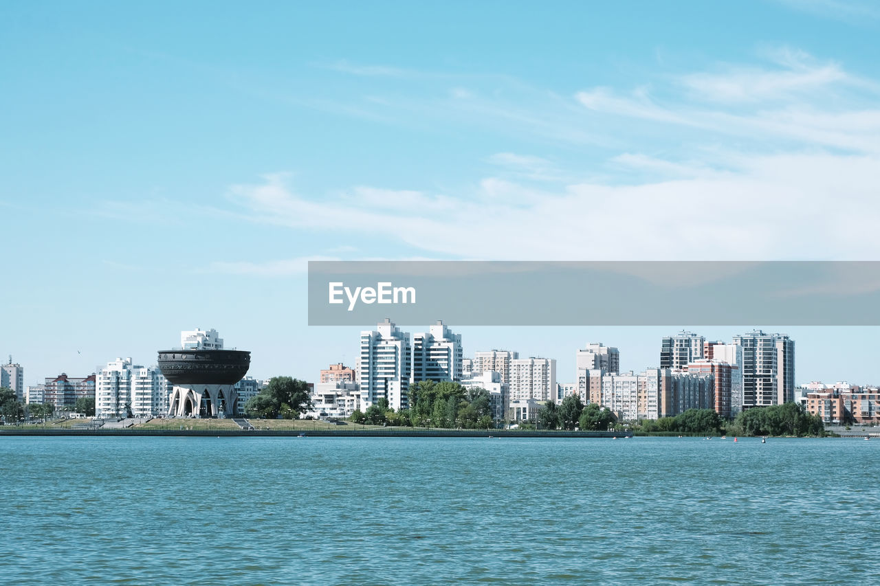 View of the city from the embankment of the kazanka river - kazan, russia, july 2021. 