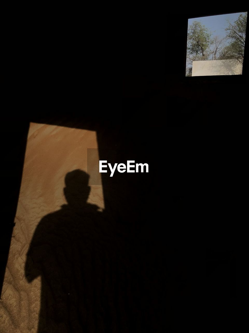 Shadow of man on wall