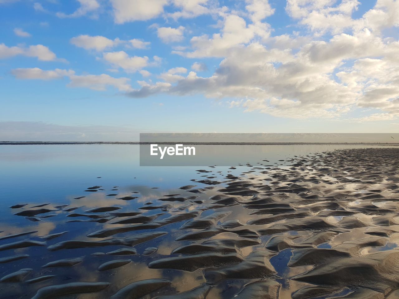 VIEW OF BEACH AGAINST SKY