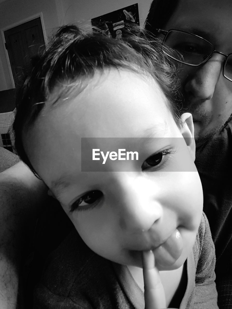 CLOSE-UP PORTRAIT OF BOY AT HOME