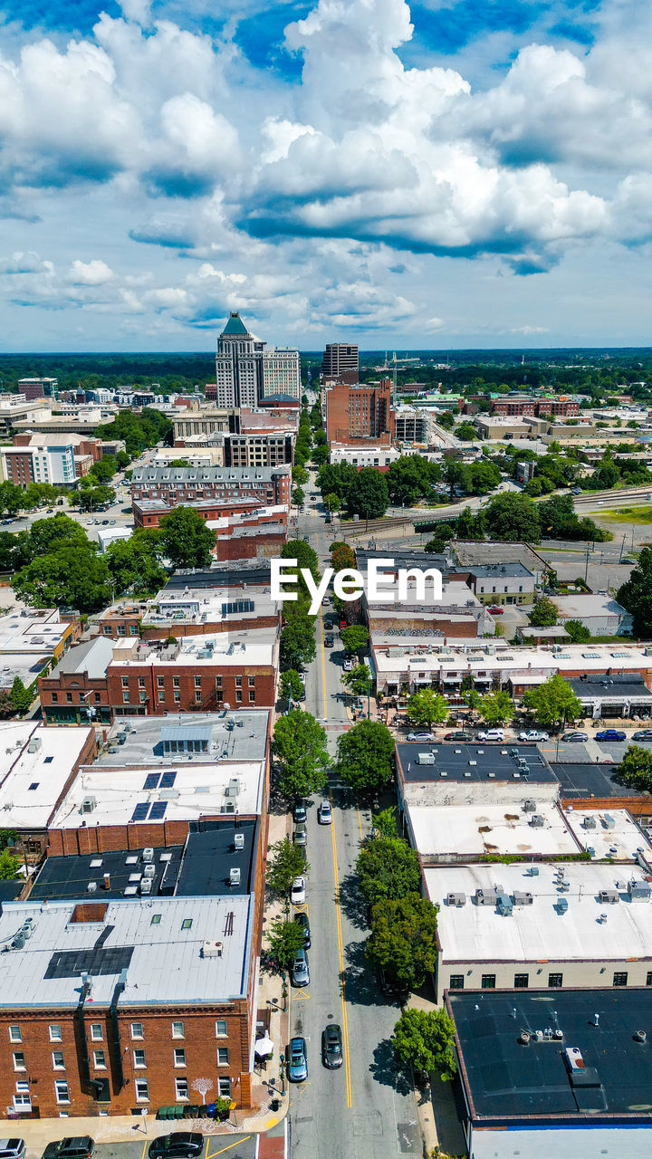 High angle view of greensboro cityscape against sky