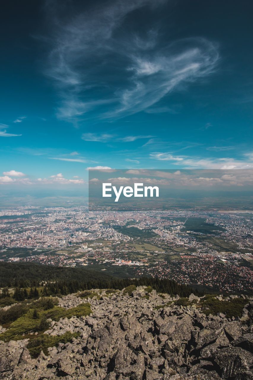 Aerial view of cityscape against sky