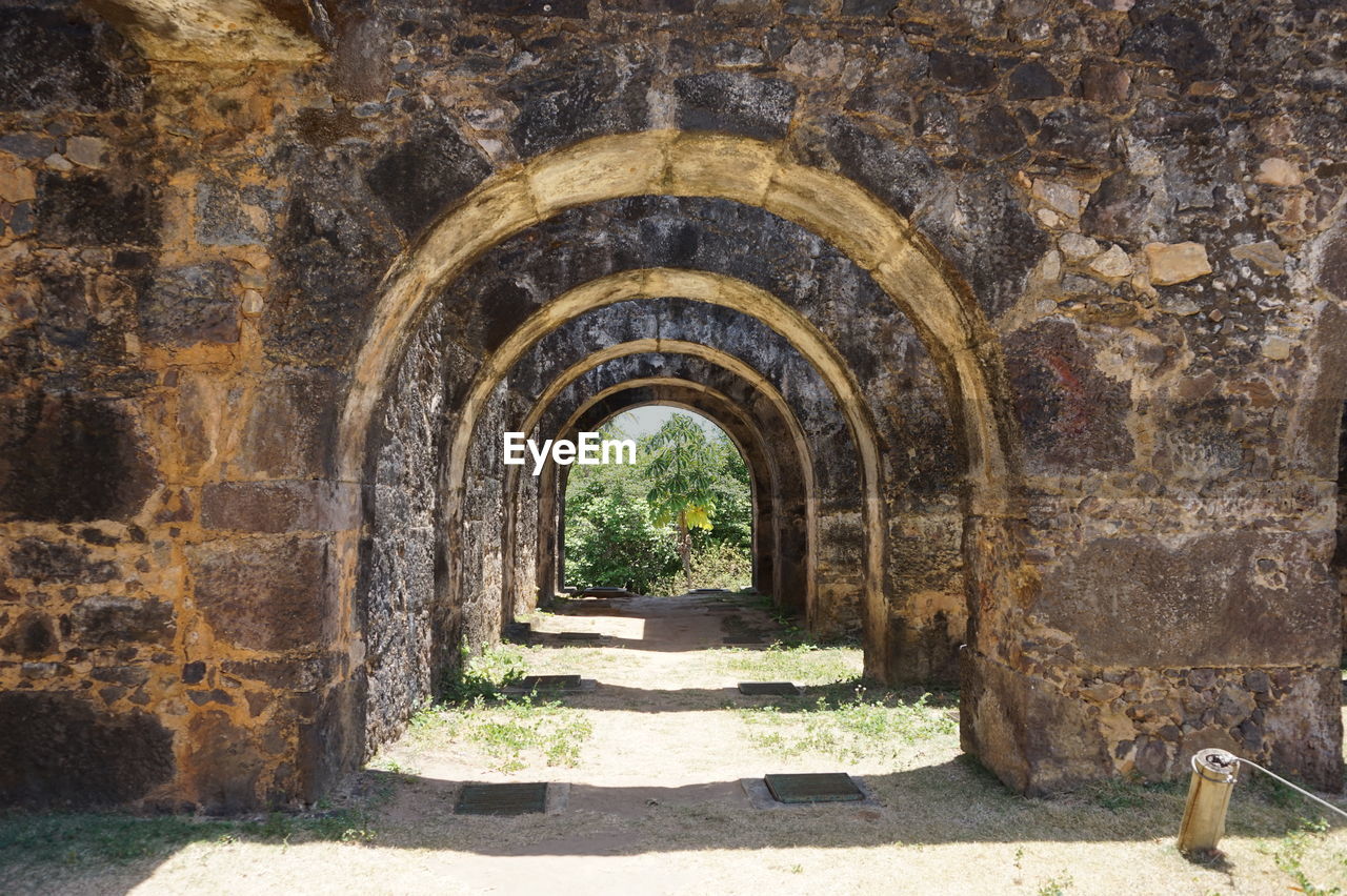 Archway of historical building during sunny day