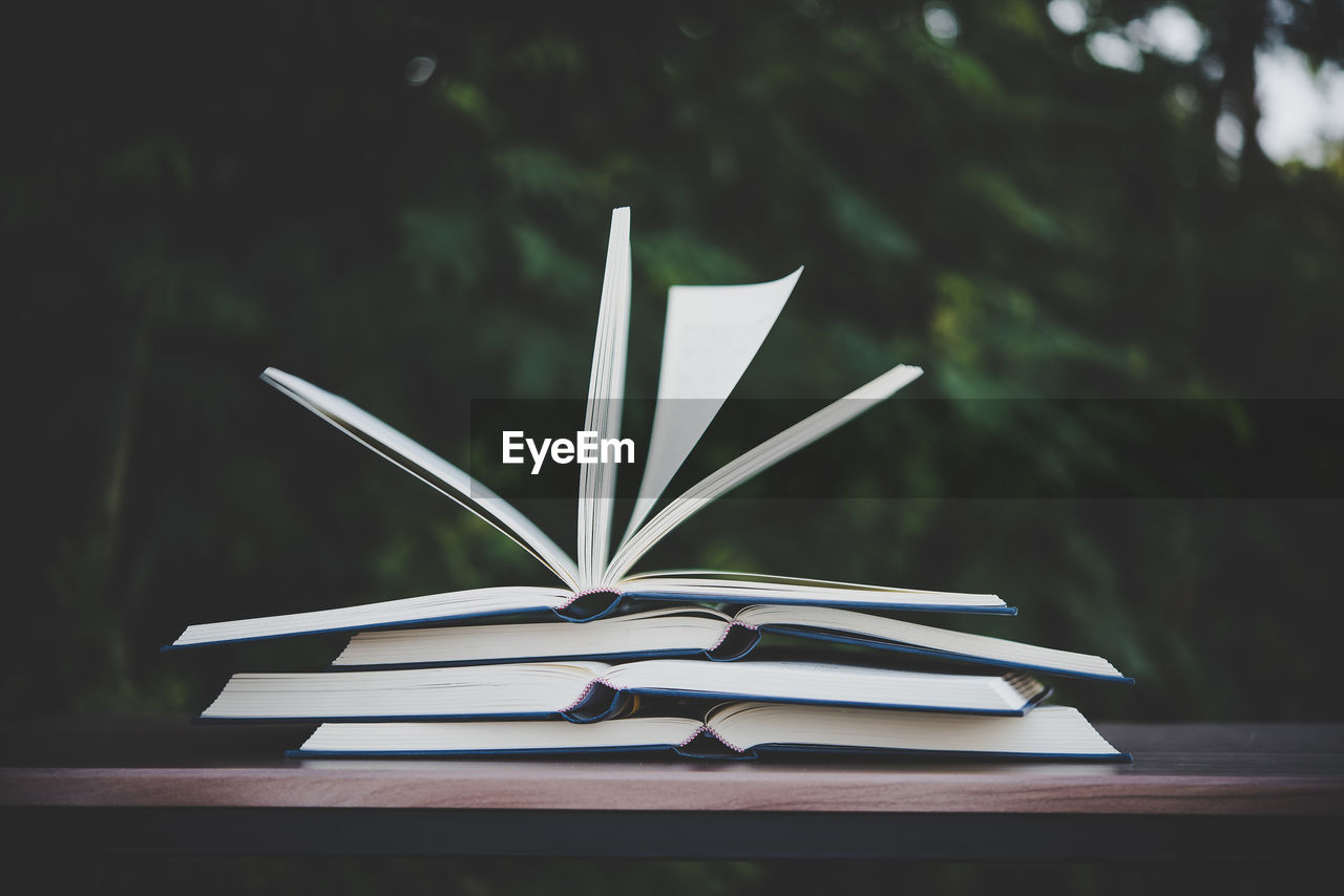 Close-up of open books on table