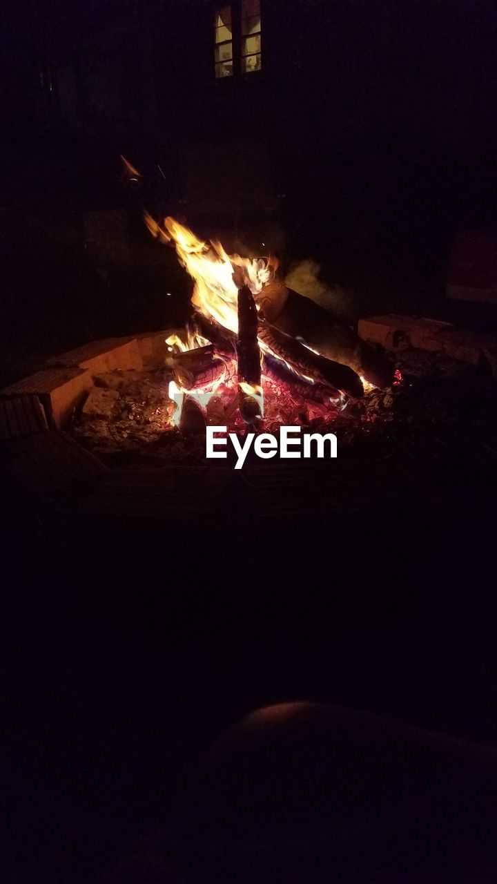 VIEW OF FIRE PIT AT NIGHT