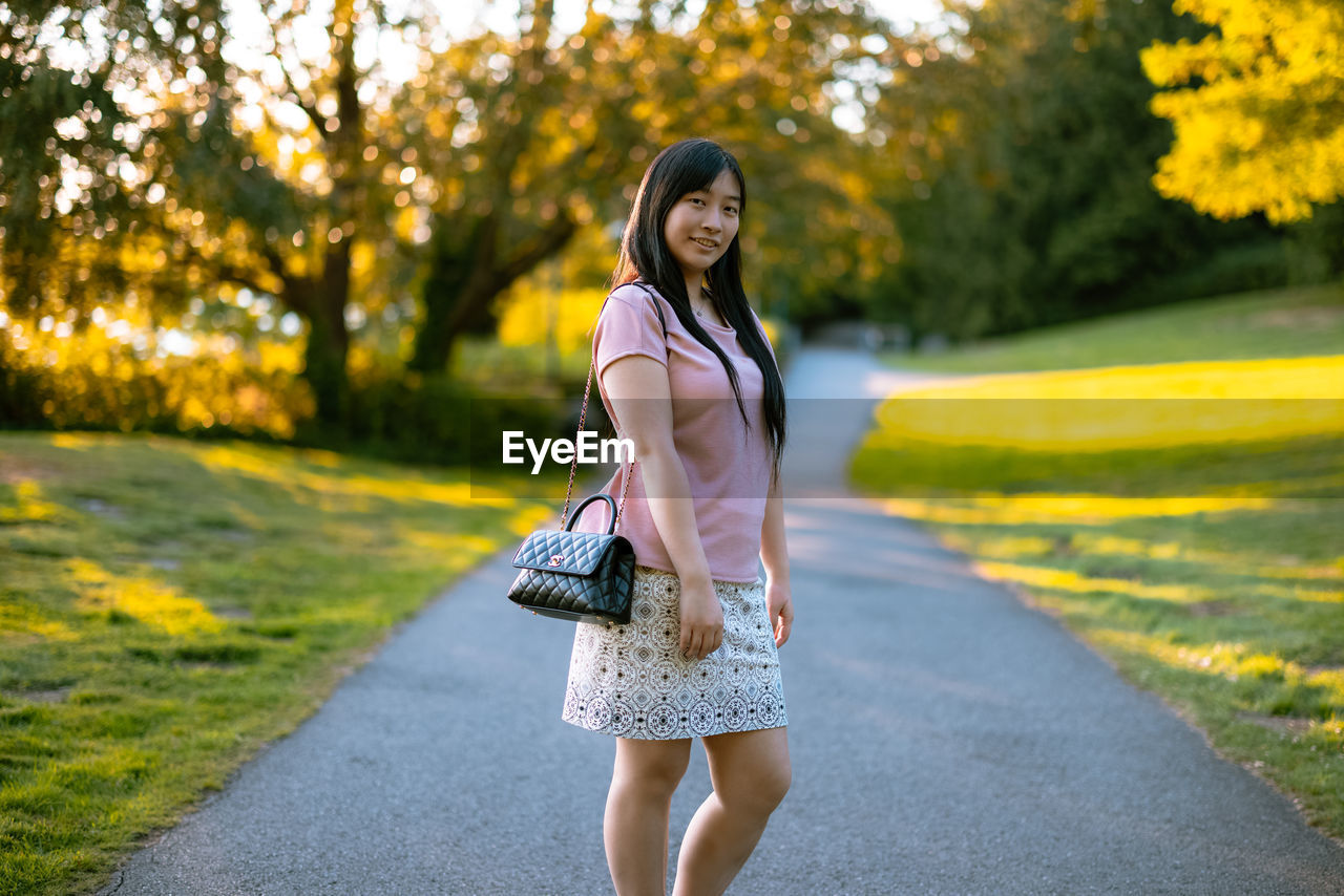 Portrait shooting in lake water park in late afternoon