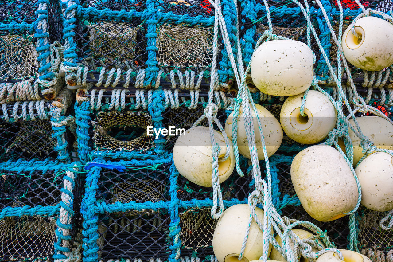 Close-up of buoys hanging from lobster traps