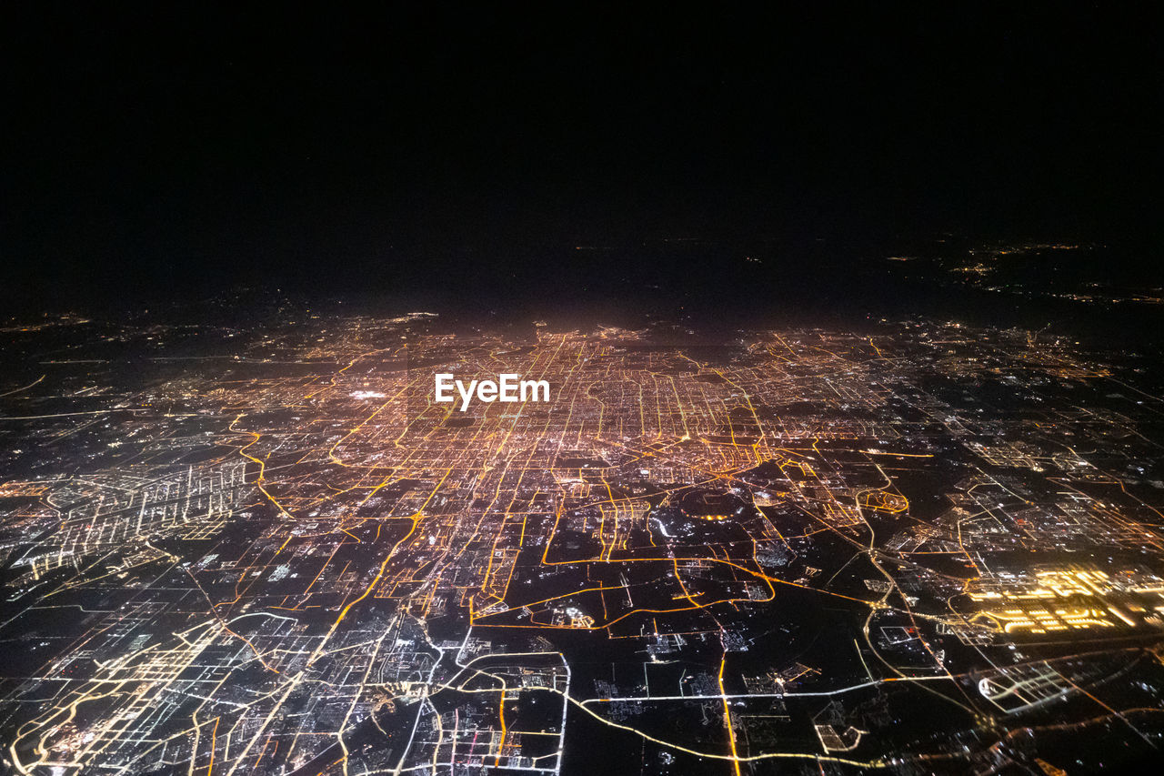 high angle view of illuminated city at night